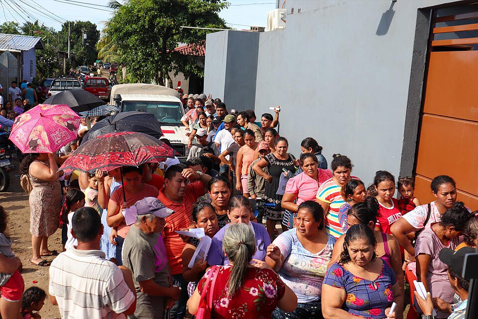 Betroffene Menschen erhalten Hilfe in Honduras im Vorfeld von Extremwetter